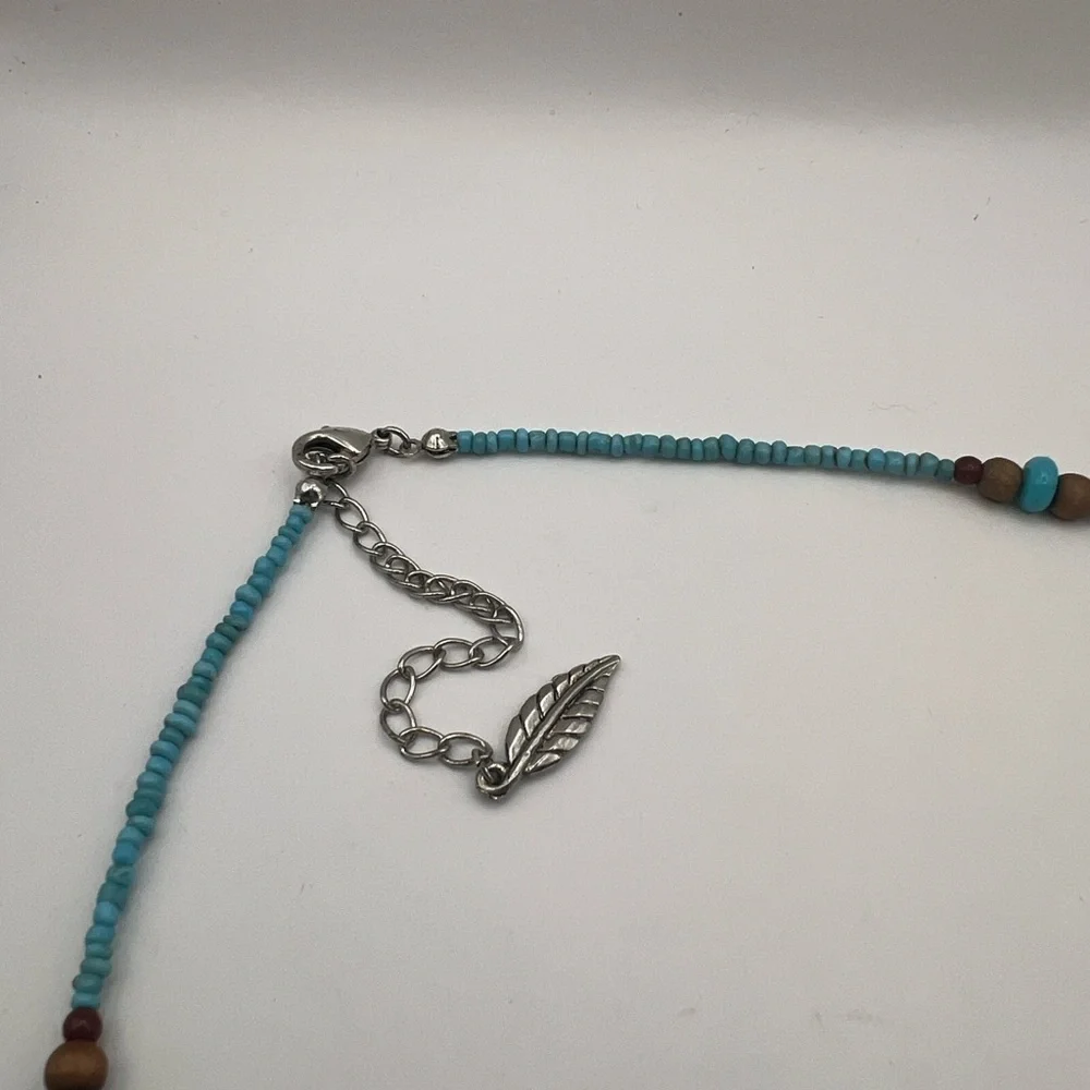 Avon Turquoise color seed pearls feather drop necklace